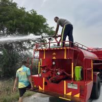 งานป้องกันและบรรเทาสาธารณภัยออกปฏิบัติหน้าที่ดับไฟลามทุ่งช่วยชาวบ้านในพื้นที่ตำบลบ้านยาง